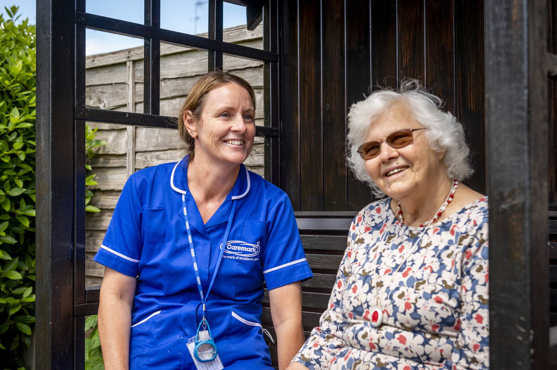 care assistant and elderly female customer