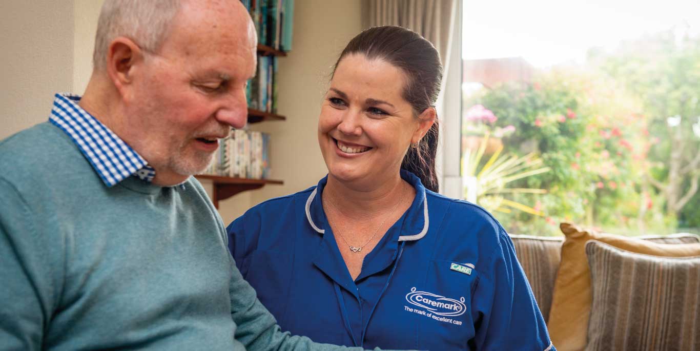 Dementia Care in Hammersmith & Fulham : man chatting to care assistant