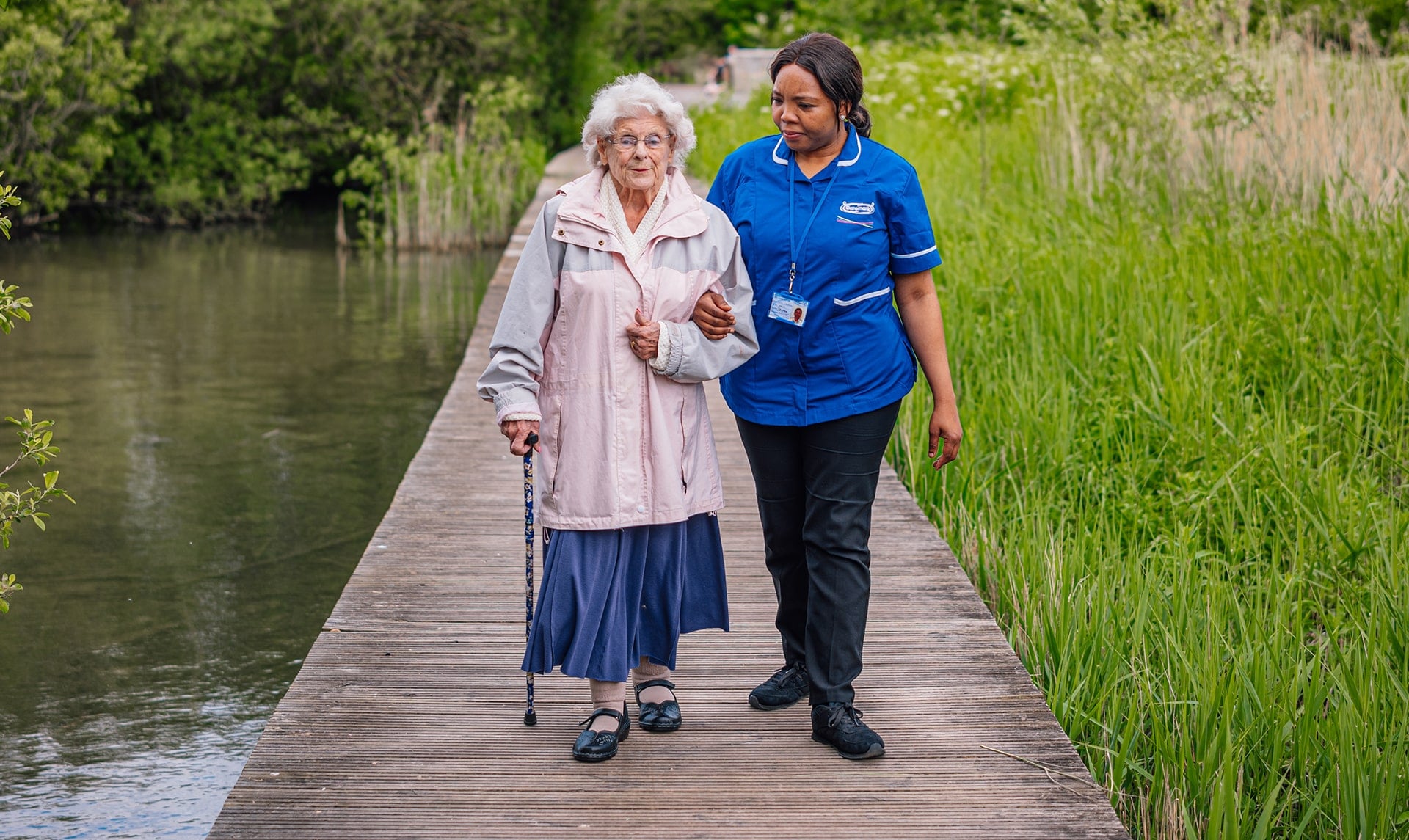 Care assistant and woman eating2 2