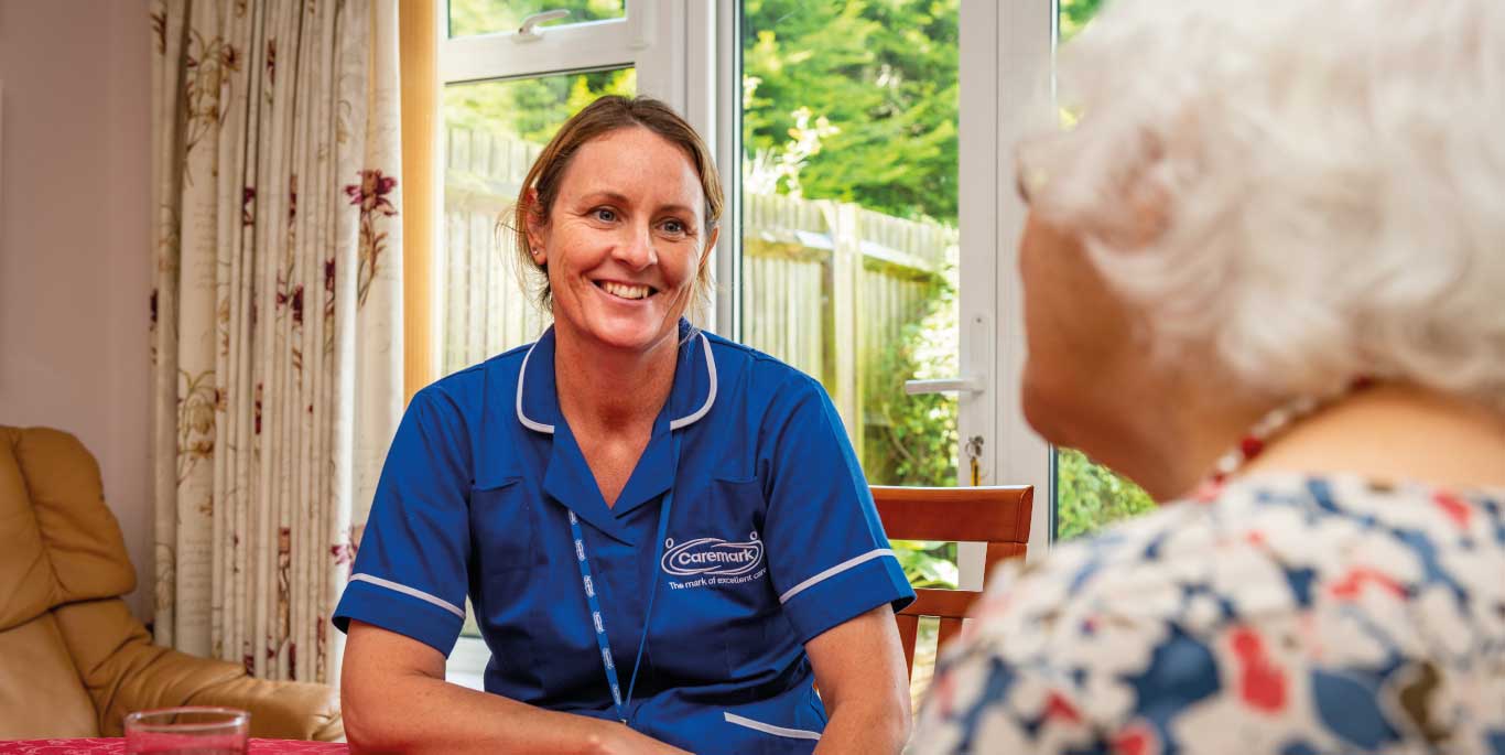 care assistant and customer in the kitchen