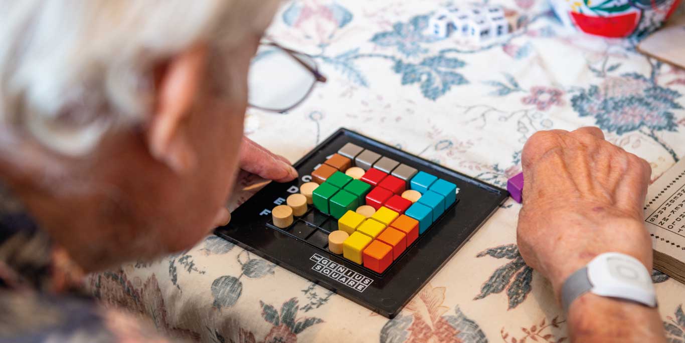 Respite Care in Cheshire North East : male customer playing game