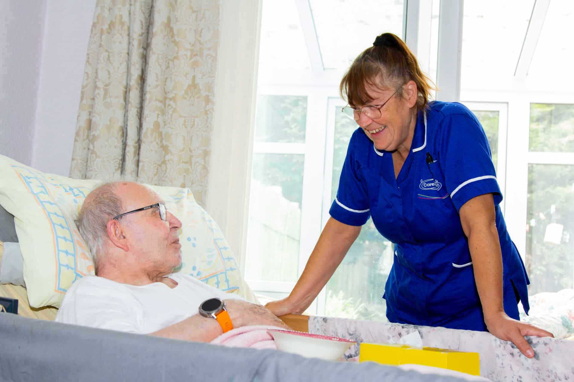 Palliative Care in Cannock Chase female care assistant with male customer - night care