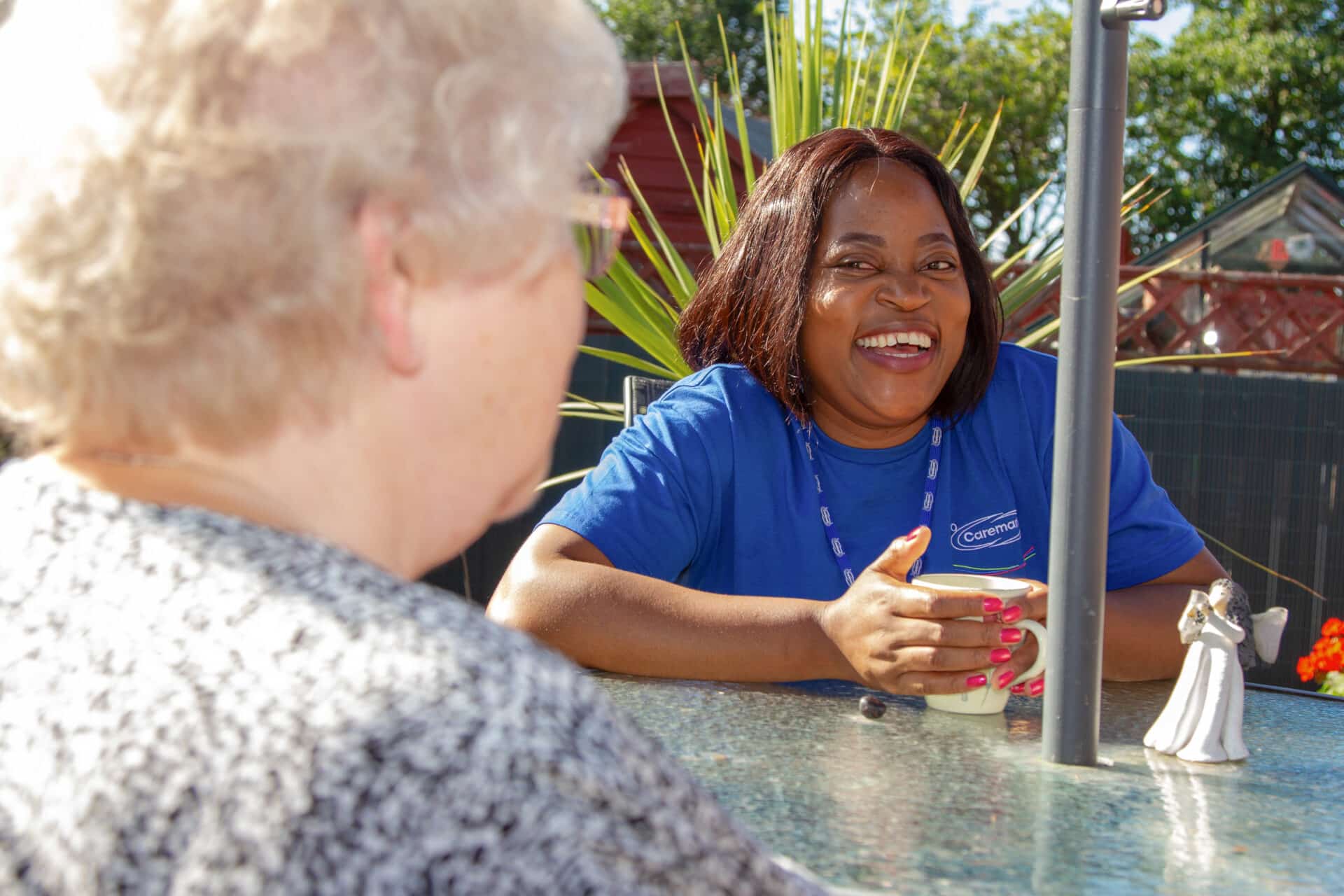 Dementia Care in Stratford Upon Avon : female care assistant smiling