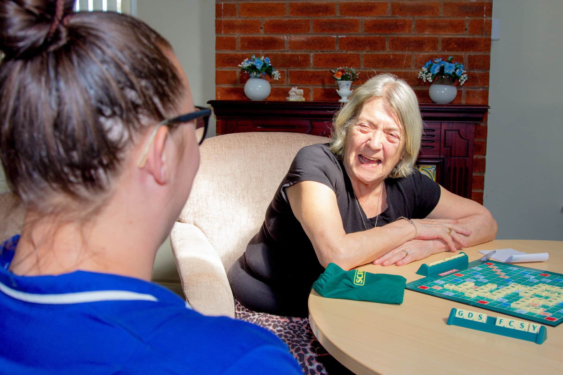 Companionship Care in Harlow & Epping Forest : female customer laughing