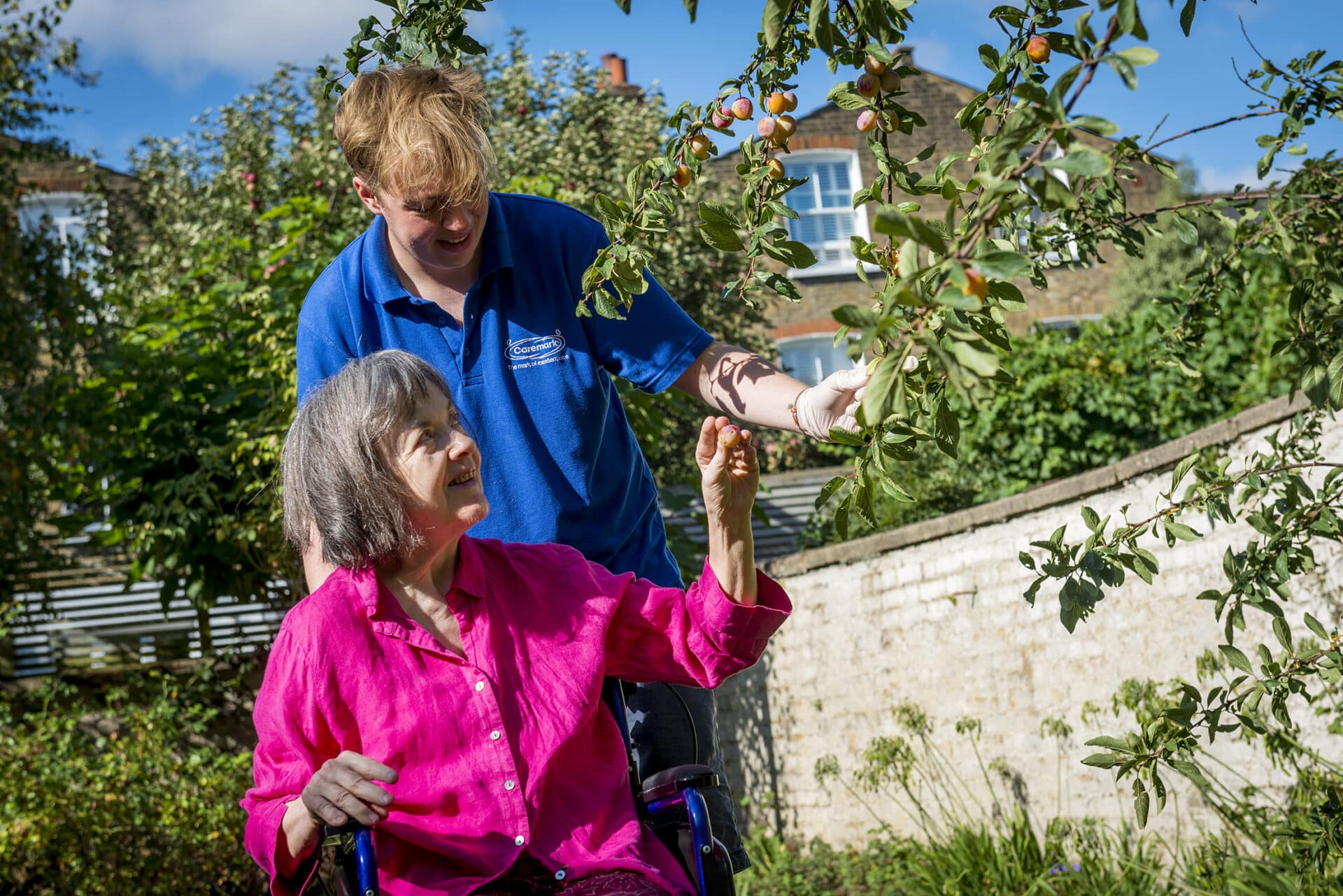 home care in cambridge: care assistant and customer in the garden