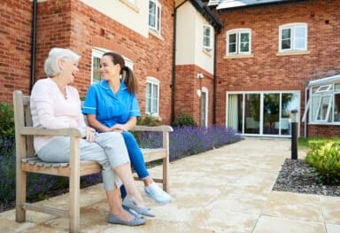 Senior-Woman-Sitting-On-Bench-live-in care Caremark Cambridge & South Cambridgeshire