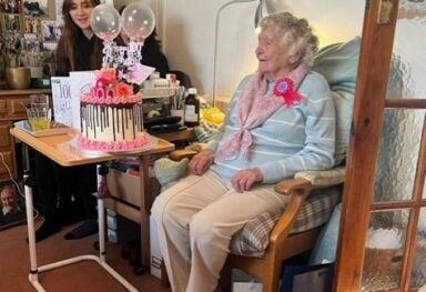 elderly lady celebrating her 100th birthday party