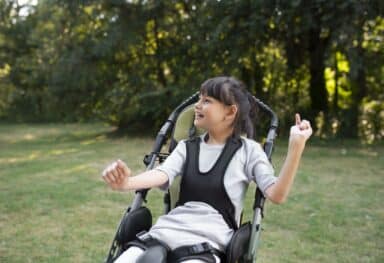 child in wheelchair with cerebral palsy