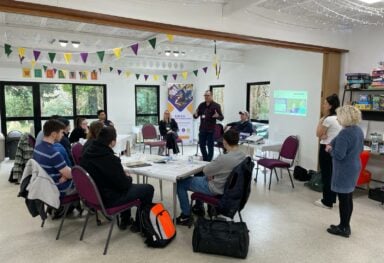 craig cameron presenting a careers talk about social care at EDGE disability consultancy to young people with learning disabilities