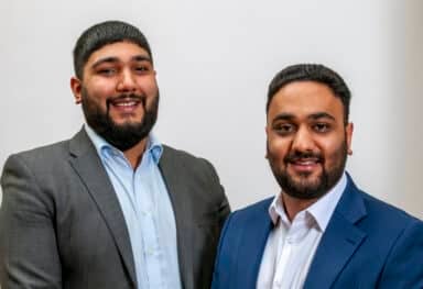 Rohan & Ricky Sood at conference ()