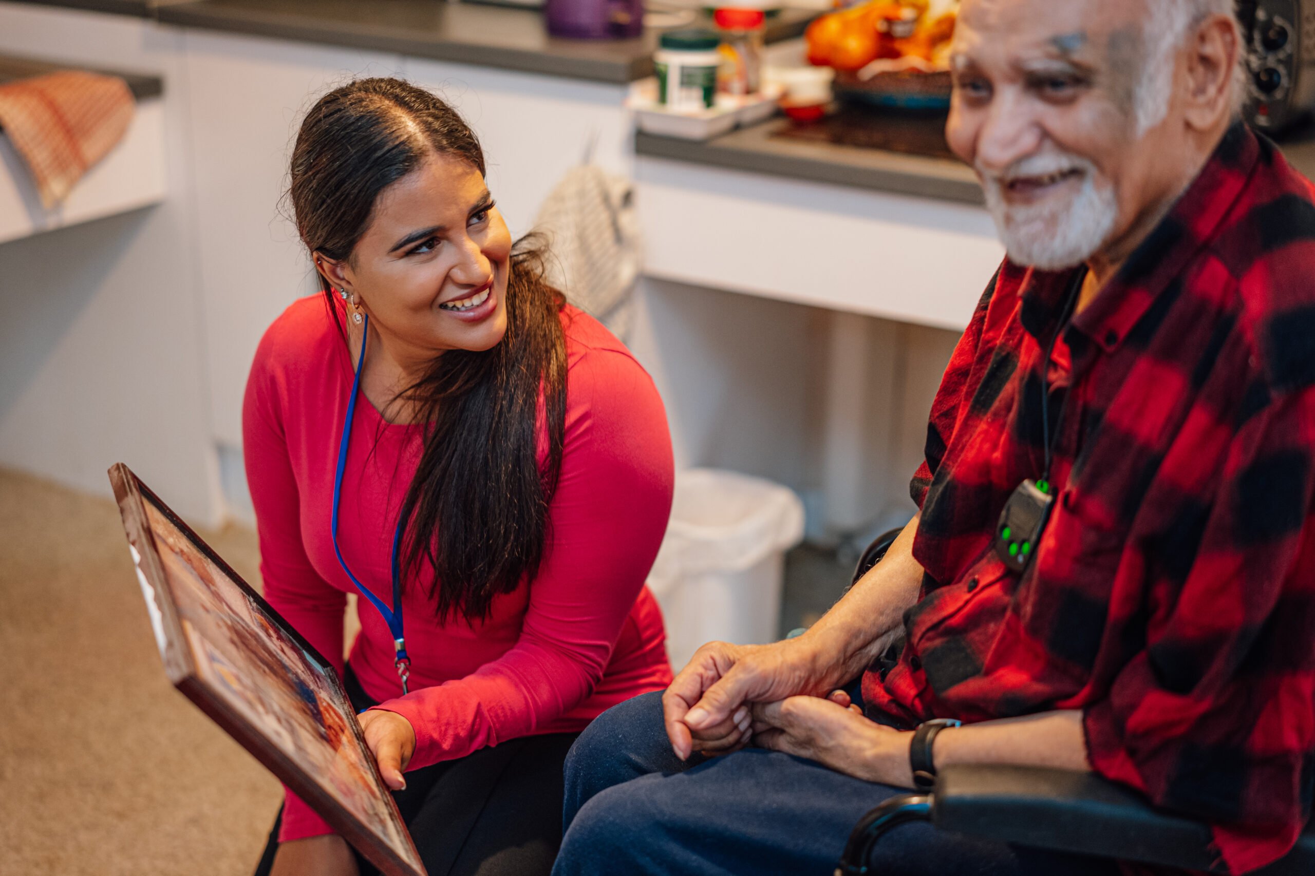 Care assistant providing Parkinson’s care and mobility support at home