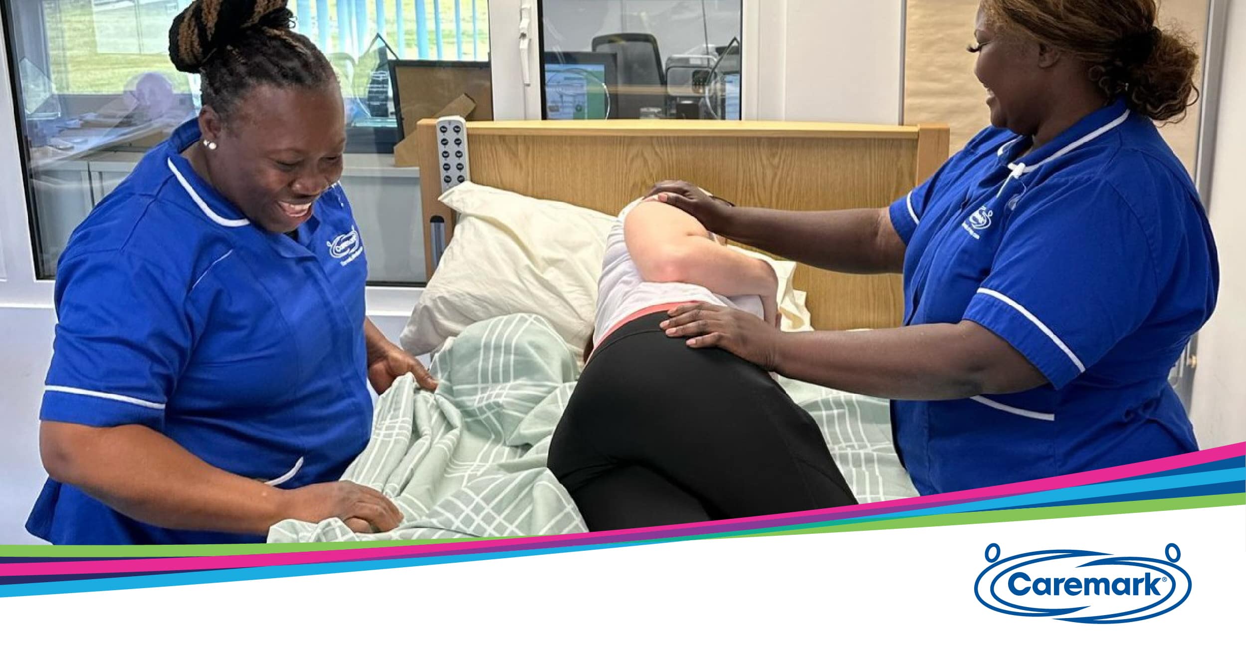 Carers moving and handling training in Caremark Cambridge's training room