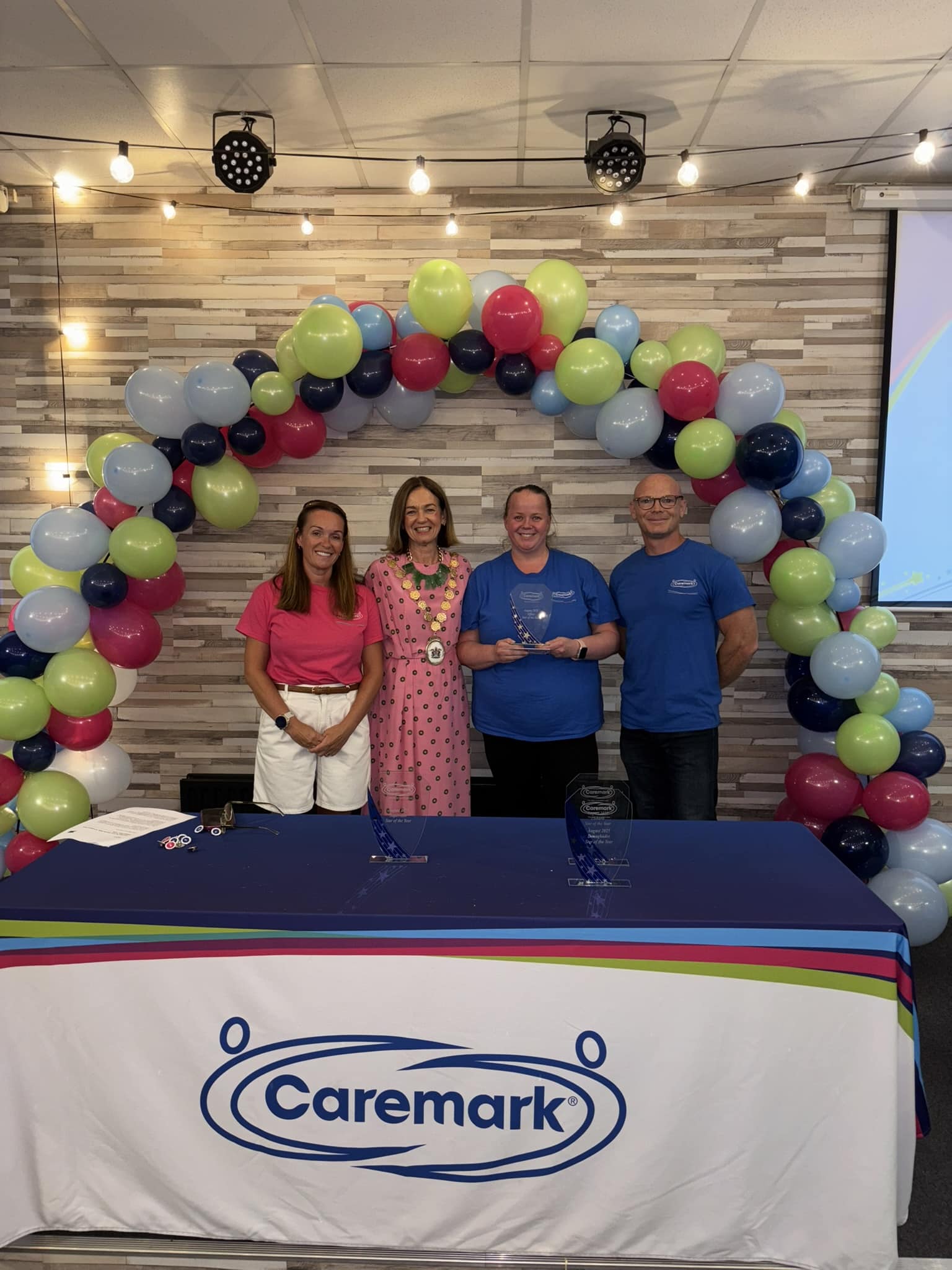 Our office Star of the Year, smiling and holding her award - Caremark NI Annual Staff Awards Day 2025