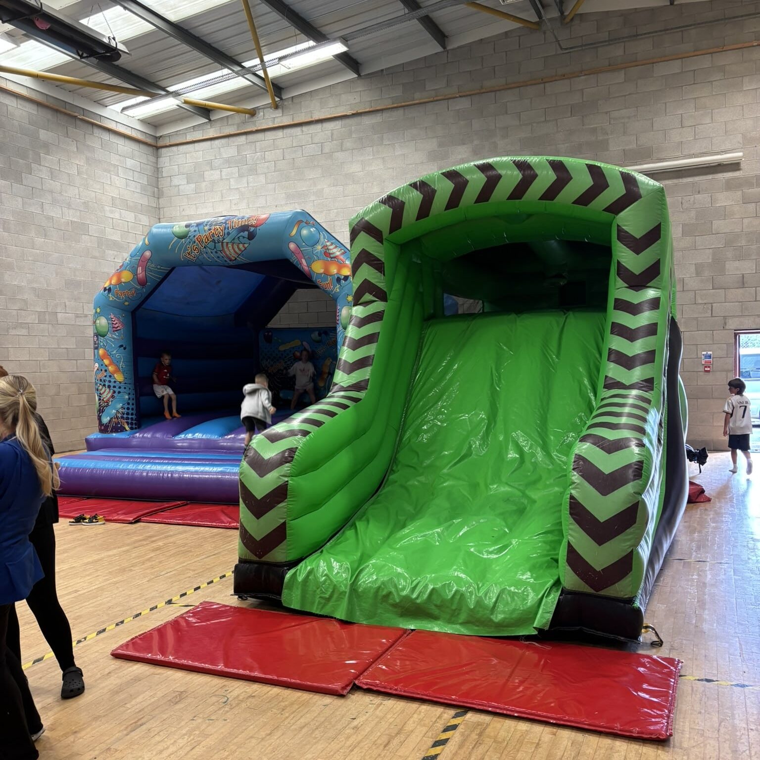 Two bouncy castles set up for children at the Caremark NI family fun day