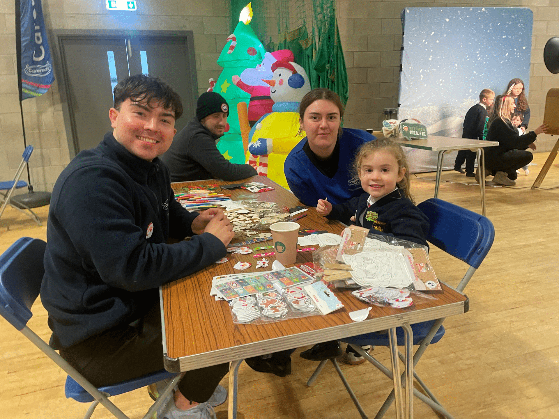 A little girl doing arts and crafts 