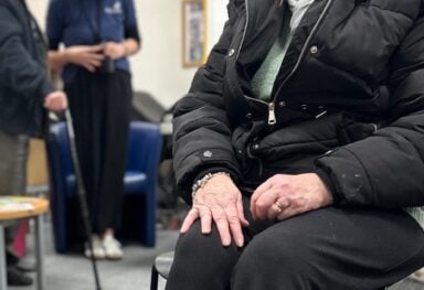 Caremark North Hertfordshire and Stevenage client attending the Hertfordshire slipper swap 2025 at Hitchin Library