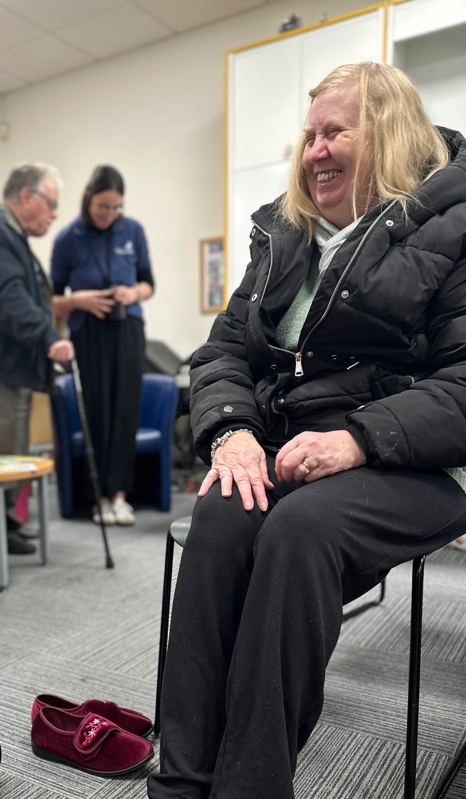 Caremark North Hertfordshire and Stevenage client attending the Hertfordshire slipper swap 2025 at Hitchin Library