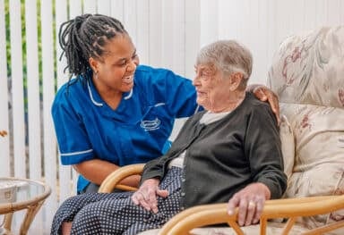 Older adult staying warm and comfortable at home during winter