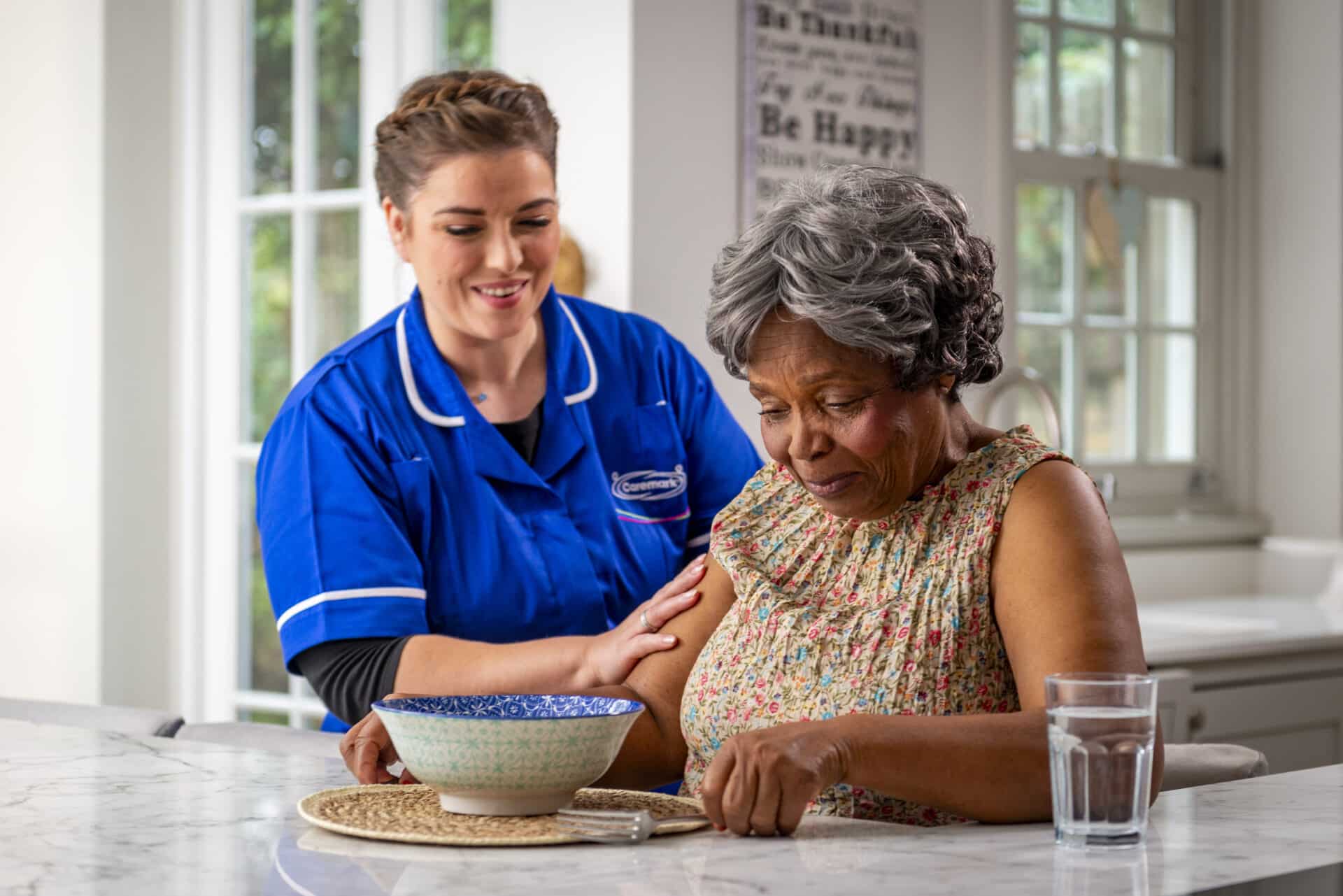 Live-In care carer supporting an older adult at home with personalised care in Liverpool