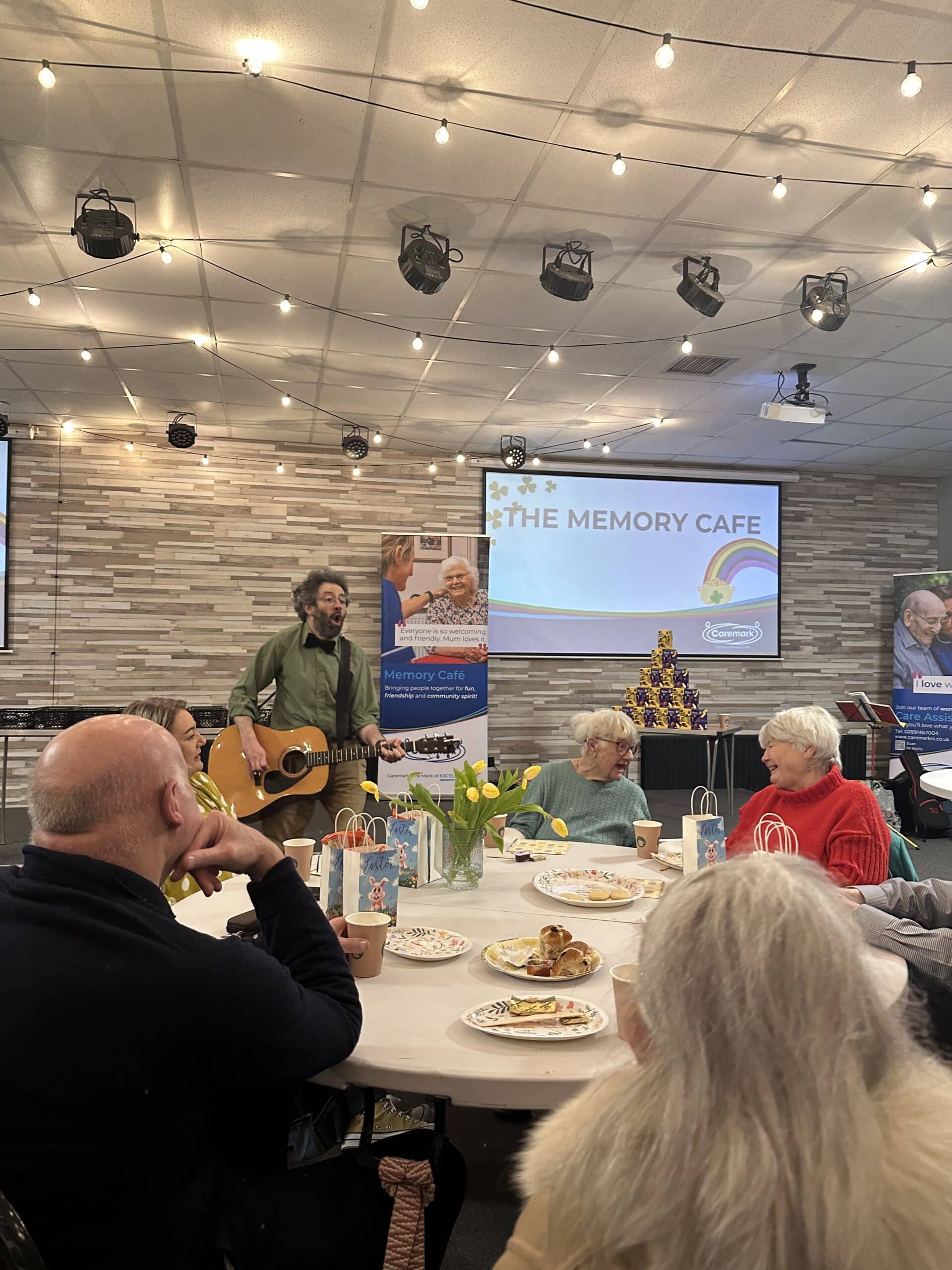 Geoff Hatt performing live music at the Memory Cafe