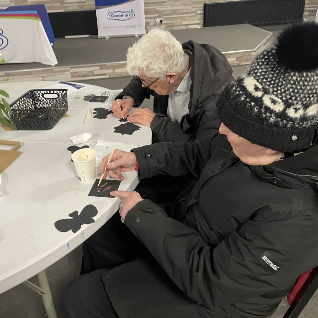Service users enjoying arts and crafts during the Memory Cafe session