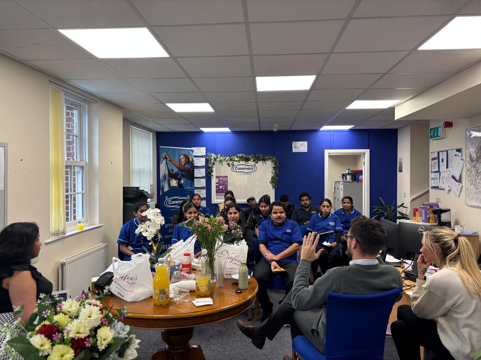 Caremark Wakefield carers attending a quarterly team meeting about improving home care services in Wakefield