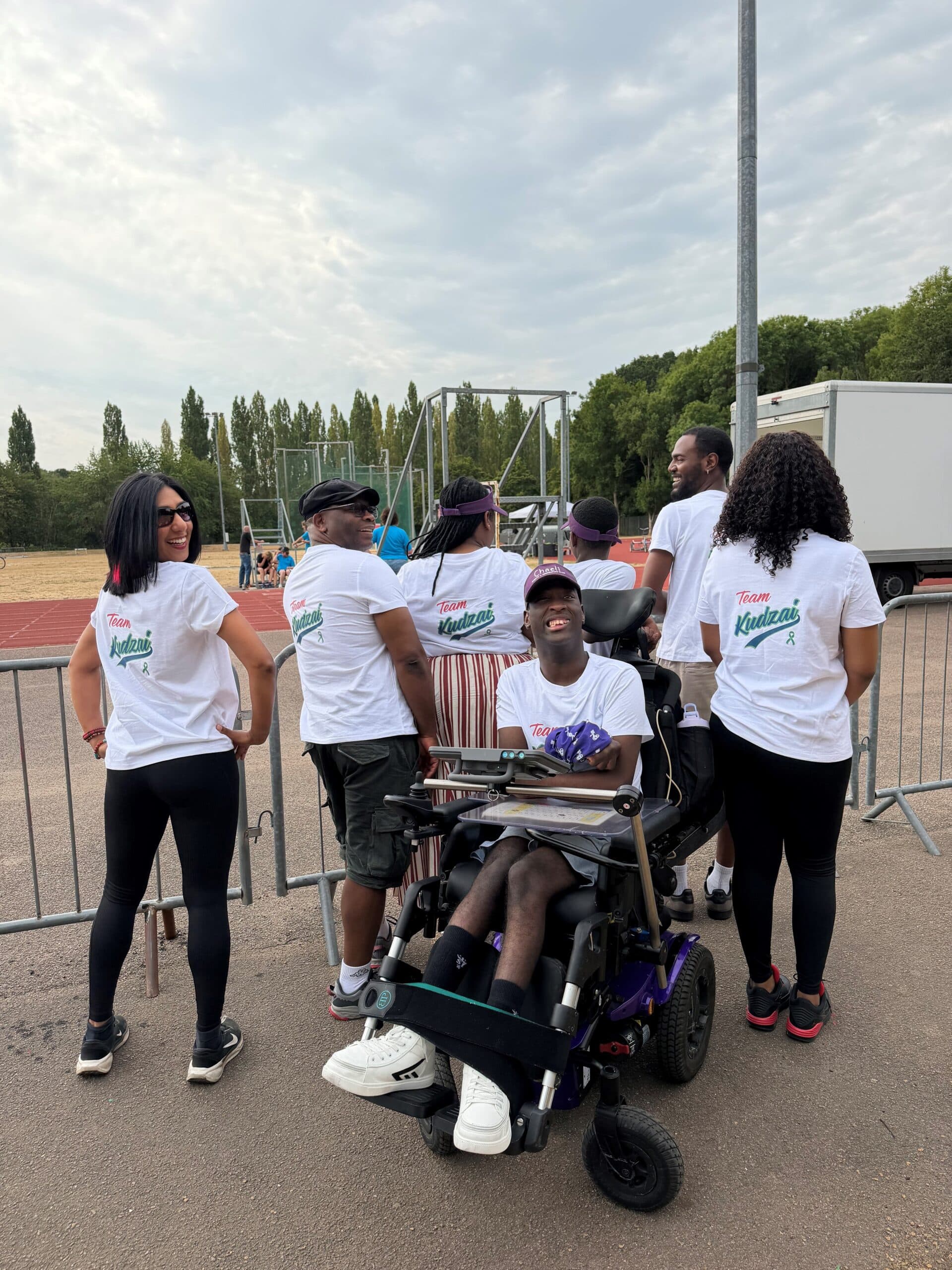 Team Kudzai. Kudzai with his mum, dad, brother, Care Assistants Esther and Kola and Marketing Manager at Caremark North Herts and Stevenage.